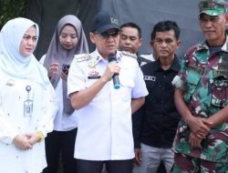 Pj Bupati Kampar Tinjau Korban Banjir Sekaligus Penyerahan Bantuan