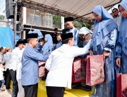 Plh Sekda Kampar Hadiri Halal Bihalal Sekaligus Santuni Anak Yatim Piatu di Desa Teratak