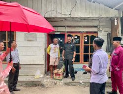 Pj Sekda Kampar Serahkan Bantuan Kepada Masyarakat Yang Sakit dan Kurang Mampu